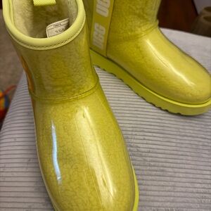 UGG Classic Clear Mini Boots in a yellow colorway often referred to as Sulfur
